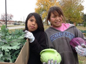 Photo Credit: USDA - Students at Circle of Nations School in Wahpeton, ND gather vegetables that they grew in the school’s garden.