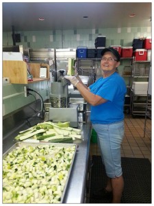 Chopping zucchini at SCASD for school lunches. Credit: SCASD