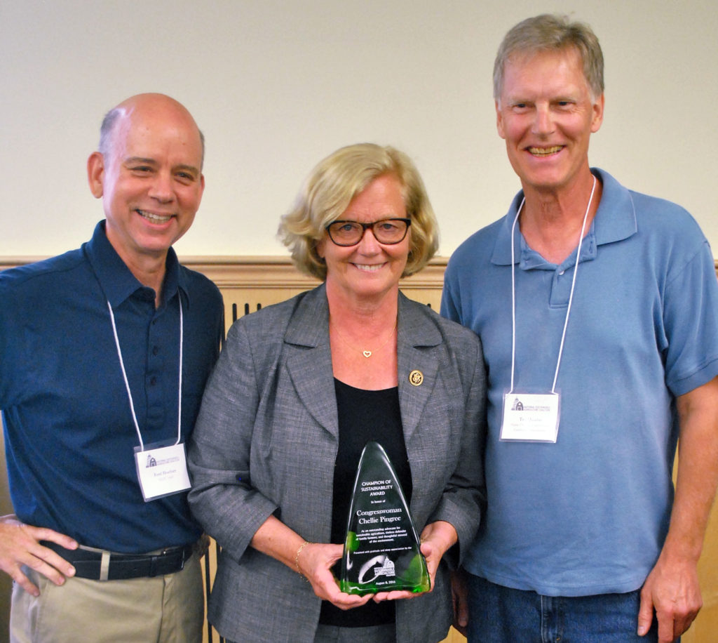 Representative Pingree accepting her Champion of Sustainability Award with Ferd Hoefner of NSAC and Ted Quaday of MOFGA.
