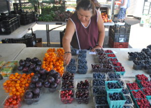 market vendor with produce