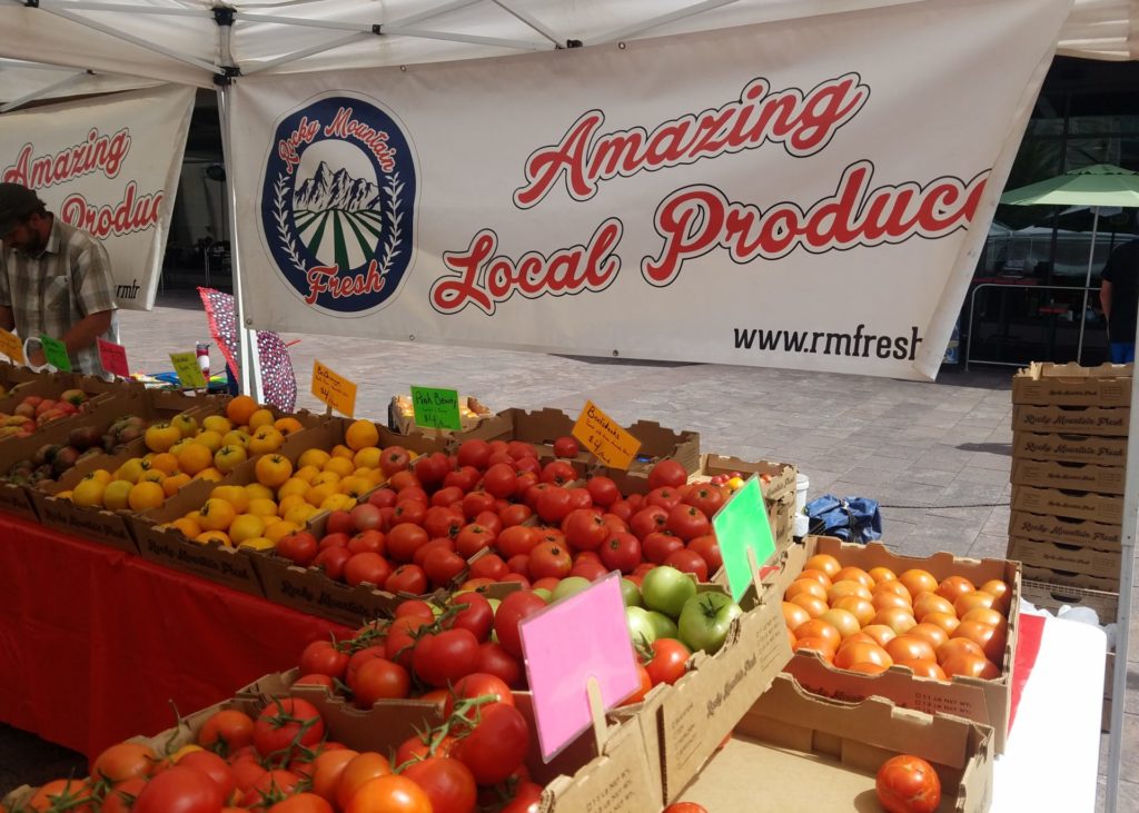 Local food (fresh tomatoes) at Denver, CO farmers' market. Photo credit: Reana Kovalcik.