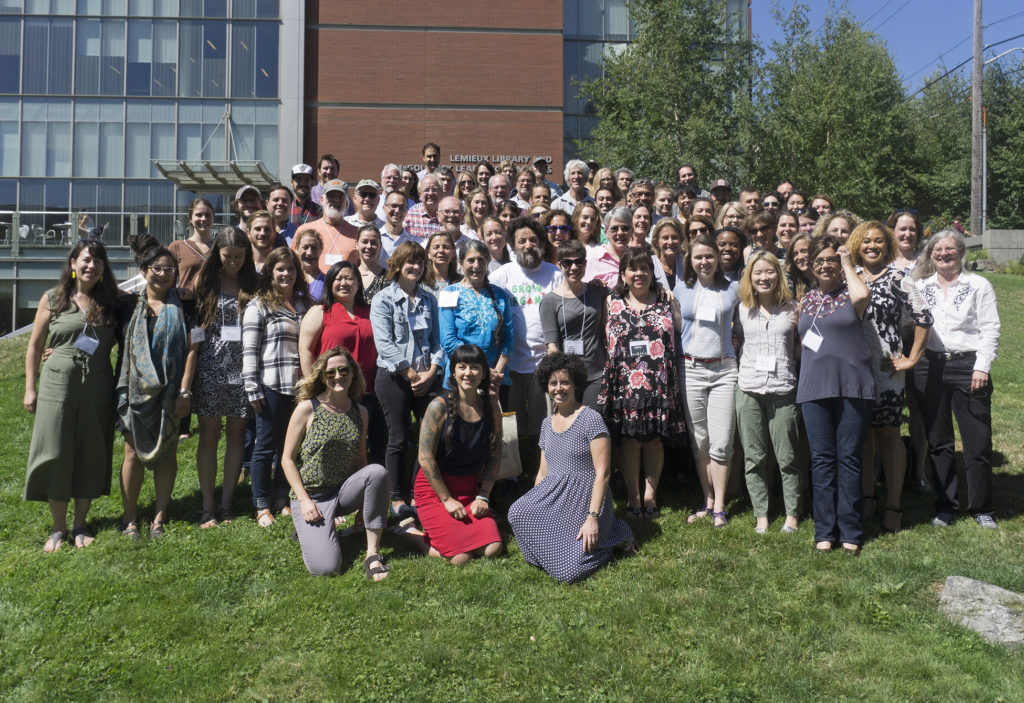 NSAC members pose for a group photo in front of Seattle University.