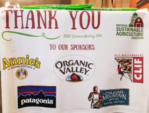 A banner showing the sponsors of the 2018 NSAC Summer Meeting